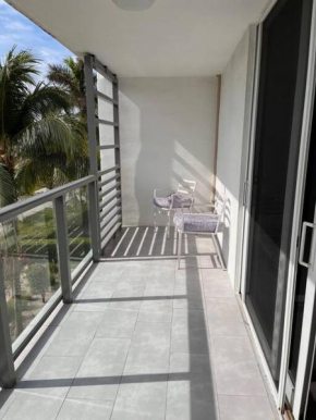 Modern spacious condo steps from the beach